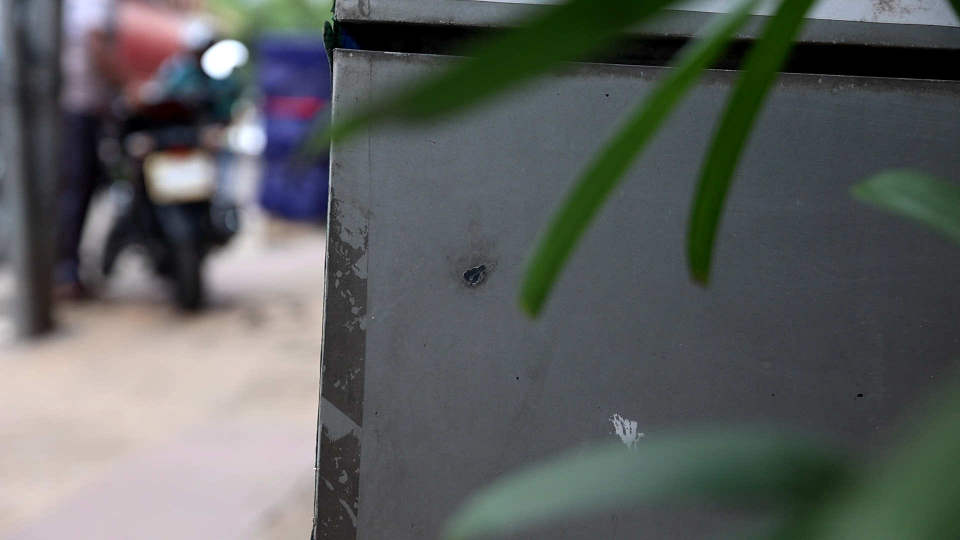 Bullet hole on Delta Hospital wall